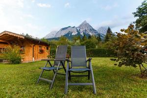 A nice rest in sun loungers on the mountain after a long hike photo