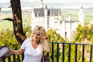 Famous Neuschwanstein castle in Germany, Bavaria, built by King Ludwig II in 19th-century photo