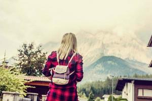 Young Woman blonde enjoying mountains landscape Travel Lifestyle happy emotions concept adventure outdoor active vacations photo