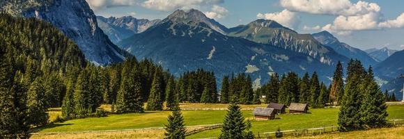 Idyllic summer landscape with clear mountain lake in the Alps photo