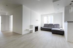 living room with fireplace after renovation photo