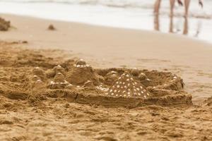 closeup of sand pattern of a beach in the summer photo