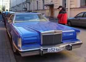 Sankt Petersburg, Russia - Mart 3, 2023. Showing current retro car Cadillac DeVille 1962 release. Background processing photos