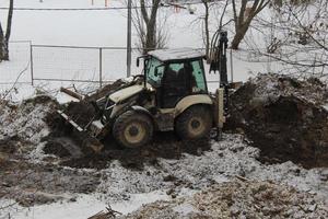 Sankt Petersburgo Rusia - 03 04 2023 excavadora trabajando en suciedad en el construcción sitio foto