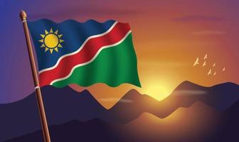 Namibia flag with mountains and sunset in the background vector