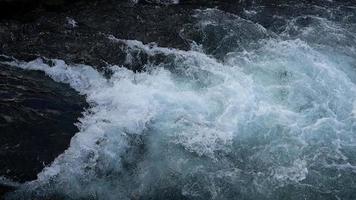 waves, boiling and splashing of the river in slow motion video
