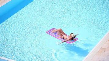 Aerial view of crisp blue pool at resort video