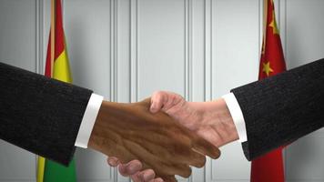 bolivia y China funcionarios negocio reunión. diplomacia acuerdo animación. socios apretón de manos 4k video