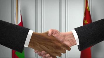 Oman and China Officials Business Meeting. Diplomacy Deal Animation. Partners Handshake 4K video