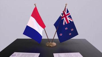 Neu Neuseeland und Frankreich National Flaggen auf Tabelle im diplomatisch Konferenz Zimmer. Politik Deal Zustimmung