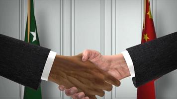 Paquistão e China funcionários o negócio reunião. diplomacia acordo animação. parceiros aperto de mão 4k video