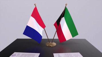 Kuwait und Frankreich National Flaggen auf Tabelle im diplomatisch Konferenz Zimmer. Politik Deal Zustimmung video