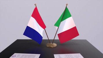 Italy and France national flags on table in diplomatic conference room. Politics deal agreement video