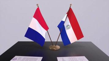 Paraguay and France national flags on table in diplomatic conference room. Politics deal agreement video