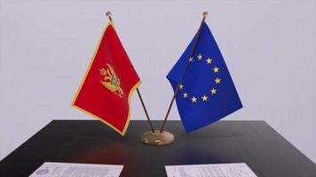 Montenegro und EU Flagge auf Tisch. Politik Deal oder Geschäft Zustimmung mit Land 3d Animation video
