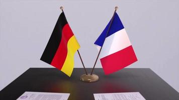 Deutschland und Frankreich National Flaggen auf Tabelle im diplomatisch Konferenz Zimmer. Politik Deal Zustimmung