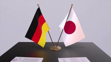 Germany and Japan national flags, political deal, diplomatic meeting. Politics and business animation video