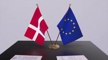Danimarca e Unione Europea bandiera su tavolo. politica affare o attività commerciale accordo con nazione 3d animazione video
