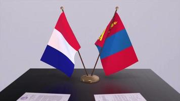 Mongolei und Frankreich National Flaggen auf Tabelle im diplomatisch Konferenz Zimmer. Politik Deal Zustimmung