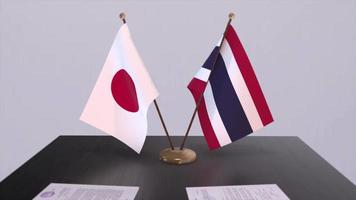 thailand och japan nationell flaggor, politisk handla, diplomatisk möte. politik och företag animering video