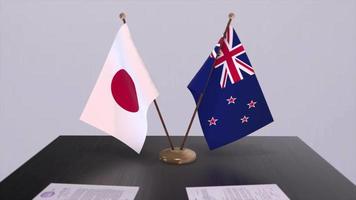 New Zealand and Japan national flags, political deal, diplomatic meeting. Politics and business animation video