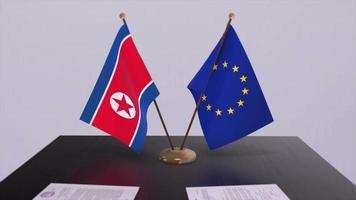 North Korea and EU flag on table. Politics deal or business agreement with country 3D animation video