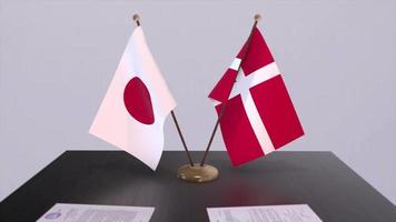 Denmark and Japan national flags, political deal, diplomatic meeting. Politics and business animation video