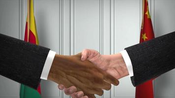 Cameroon and China Officials Business Meeting. Diplomacy Deal Animation. Partners Handshake 4K video