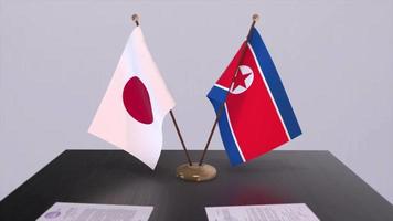 North Korea and Japan national flags, political deal, diplomatic meeting. Politics and business animation video