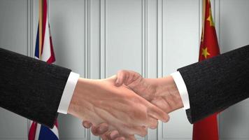 Reino Unido Unidos reino e China funcionários o negócio reunião. diplomacia acordo animação. parceiros aperto de mão 4k video