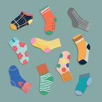 Set of trendy colorful socks. Modern socks in different colours top down view. Cartoony design for web and print. vector