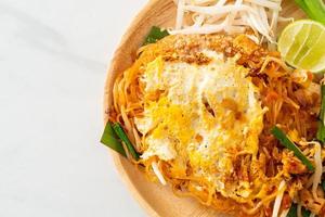 Pad Thai - stir fried noodles in Thai style with egg photo