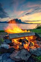 A fire on the lake during the sunset photo