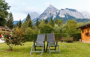 A nice rest in sun loungers on the mountain after a long hike photo