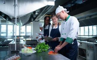 Young chef, University professor is passing on the knowledge of cooking to students photo