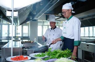 Young chef, University professor is passing on the knowledge of cooking to students photo