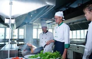 Young chef, University professor is passing on the knowledge of cooking to students photo