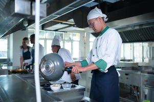 Young chef, University professor is passing on the knowledge of cooking to students photo