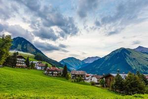 Mountain valley village landscape summer photo