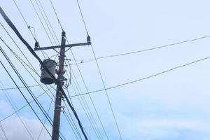 Electrical wire of high voltage over the street photo