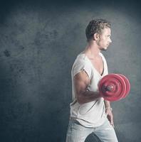 Man lifting weights photo