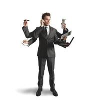 Businessman multitasking on white background photo