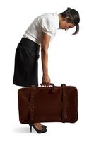 Businesswoman with suitcase photo