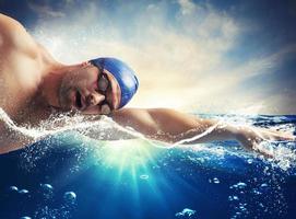 Swimmer over the sunshine photo