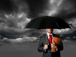 Insurance concept with umbrella photo