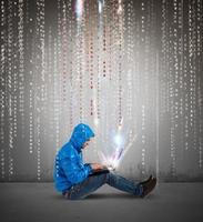 Hacker man with tech background photo