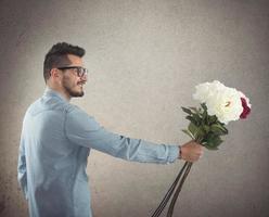 Flowers gift. Romantic man photo