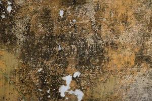 Old wall texture background full of stains and scratches, grunge texture background photo