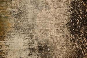 Old wall texture background full of stains and scratches, grunge texture background photo