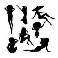 Vector graphics set of different silhouettes of girls in a hat for design